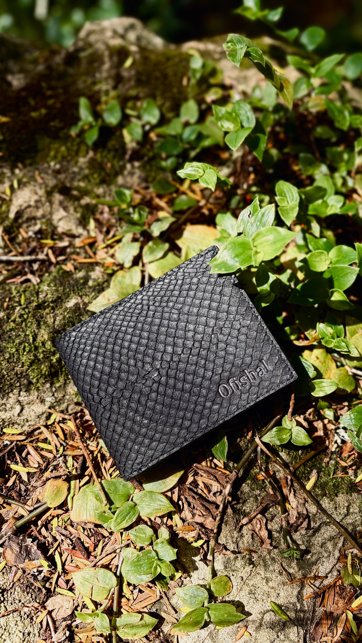 Fish leather bifold wallet open showing card pockets